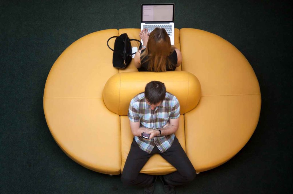 People using Wi-Fi in a public area