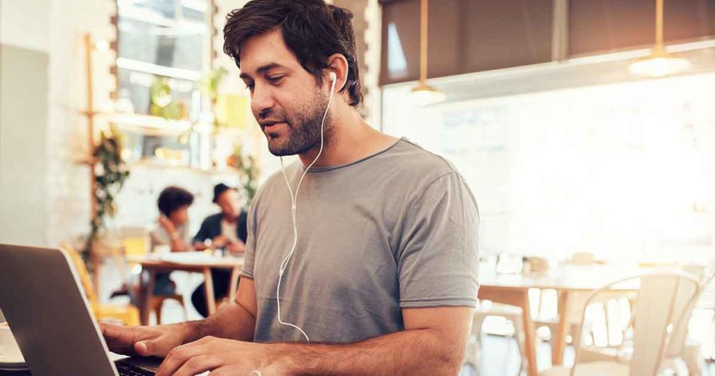 Man looking at laptop