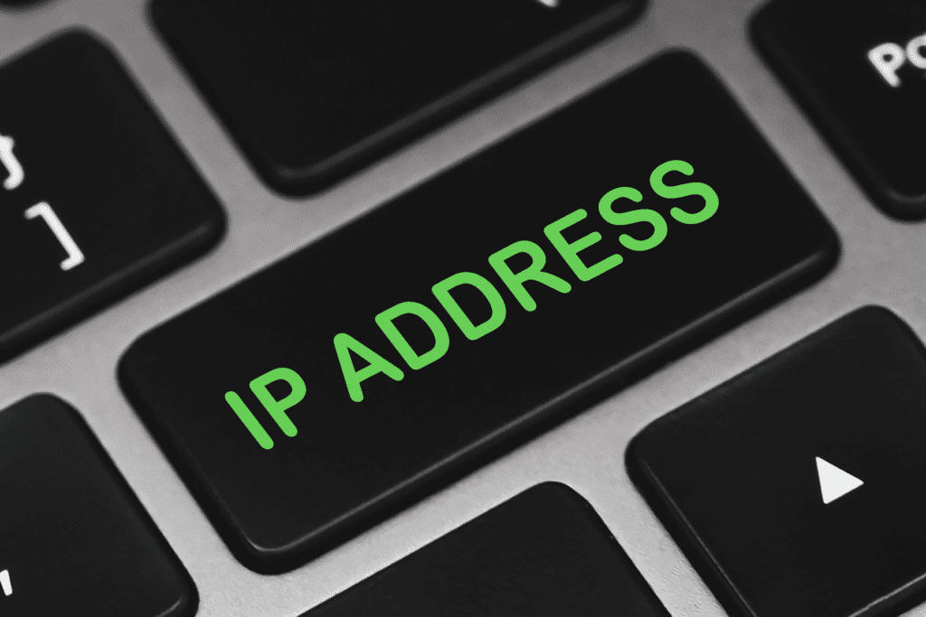 How to find someone's ip address visualized. Closeup photo of a laptop keyboard with an 'ip address' key
