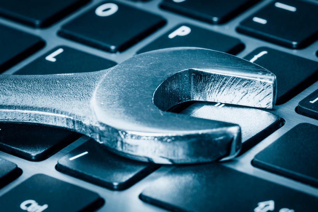 A wrench sits on a keyboard to convey free security tools