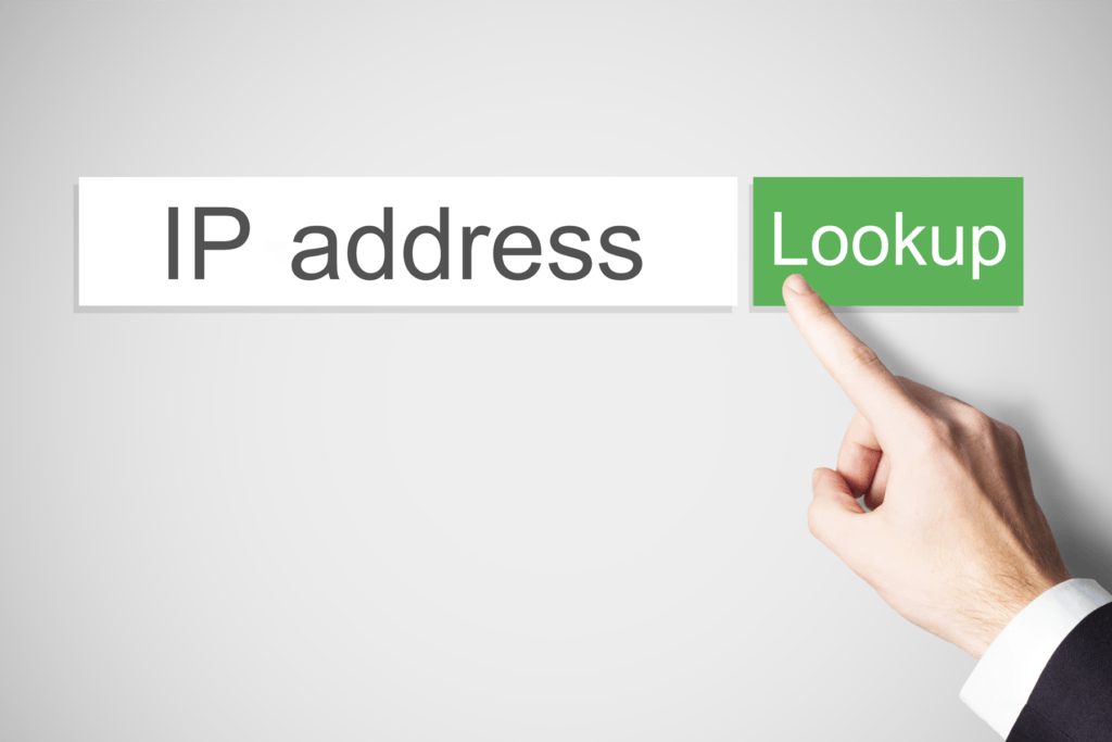Visualizing an IP lookup, a form field contains the words "IP address" with the green action button saying "Lookup" while a hand appears to click the button