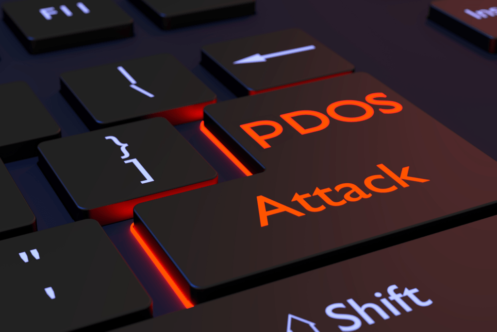 A PDOS attack is visualized on a keyboard in red text