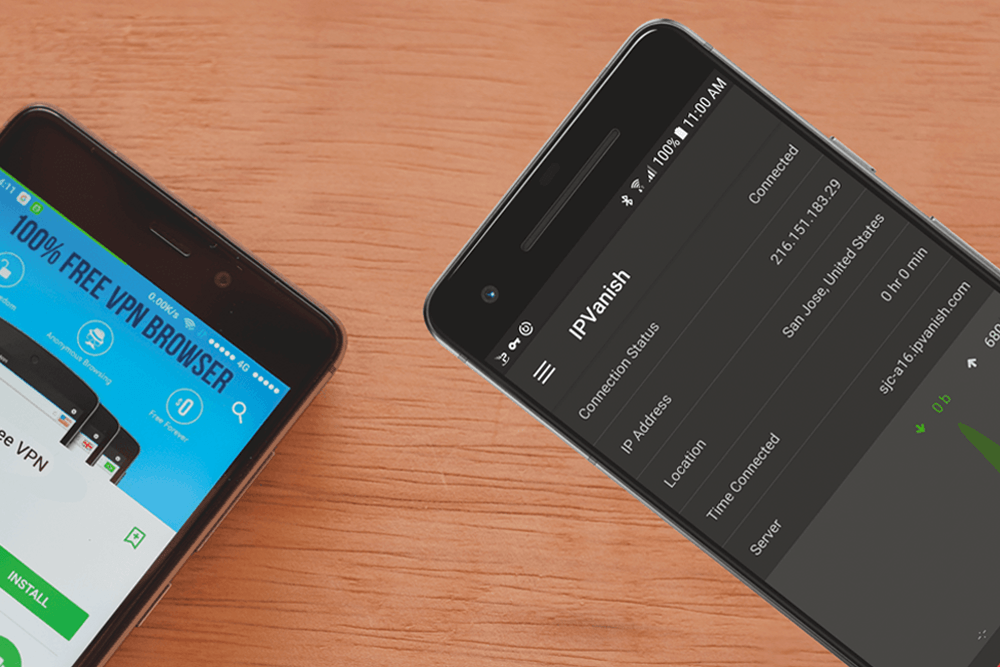 Two phones lay on a wooden table, one with a free VPN and the other with IPVanish