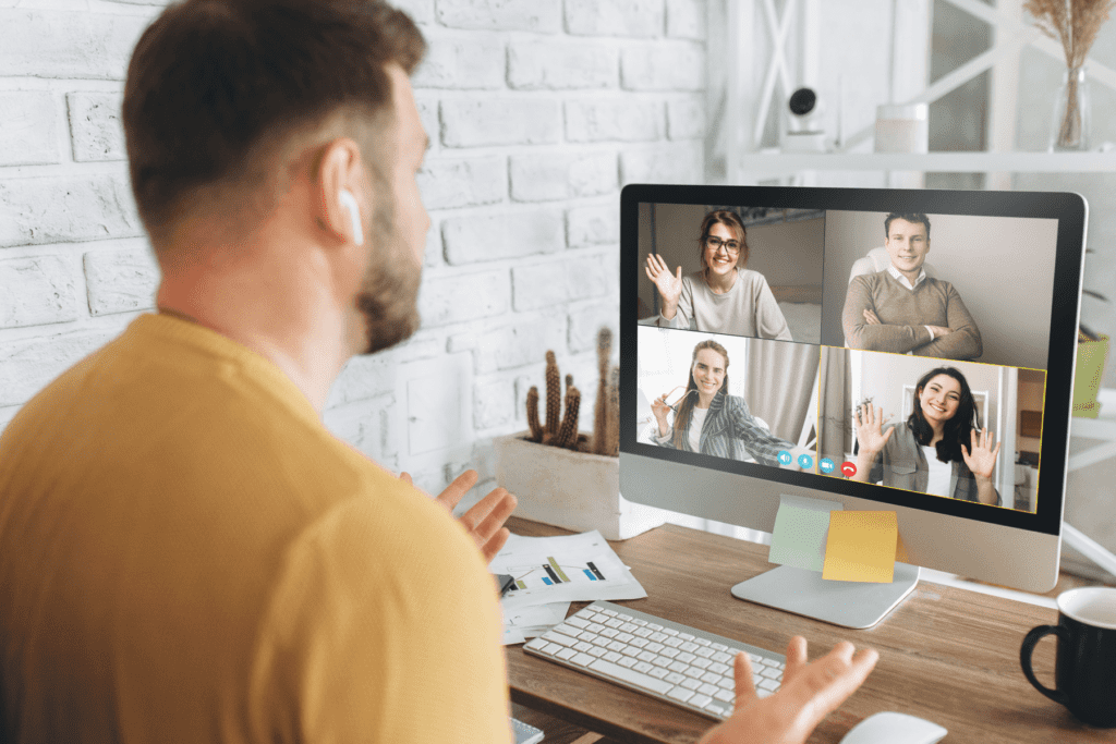 A man is seen video-chatting with friends in browser using WebRTC